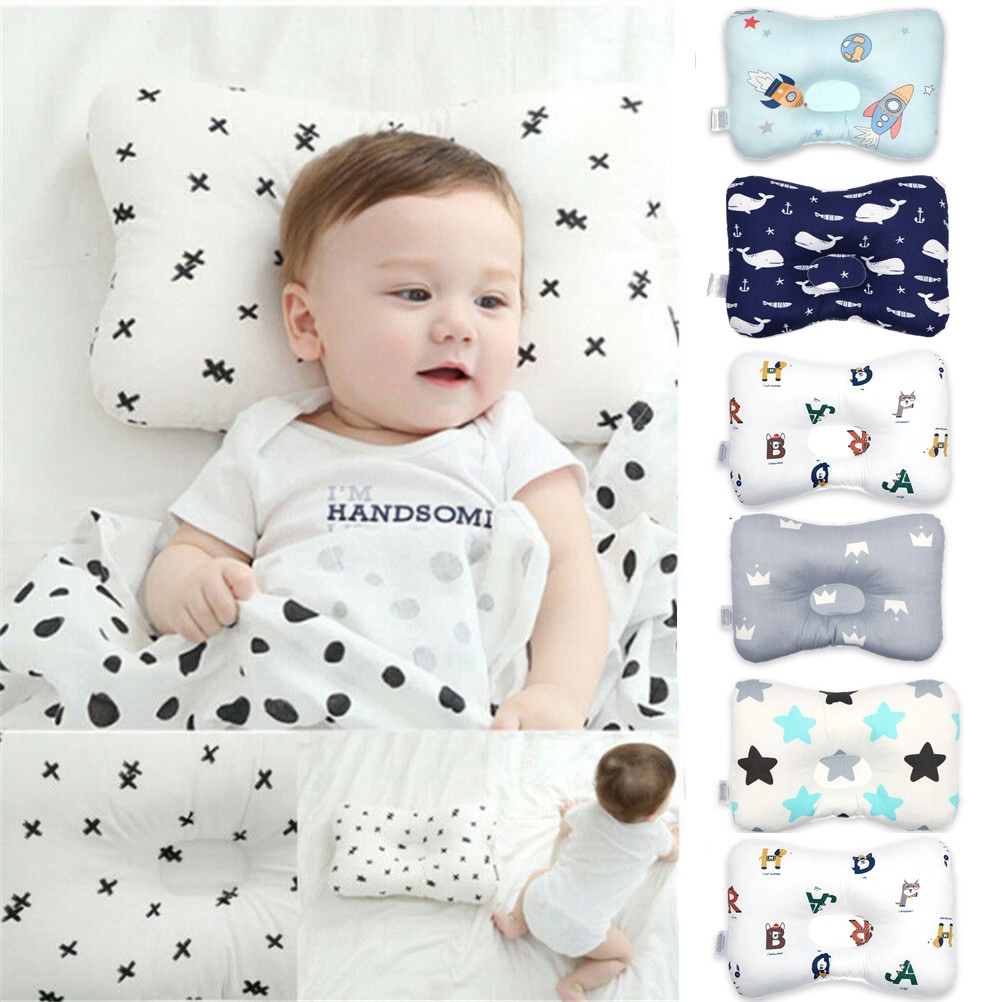 white printed baby pillow